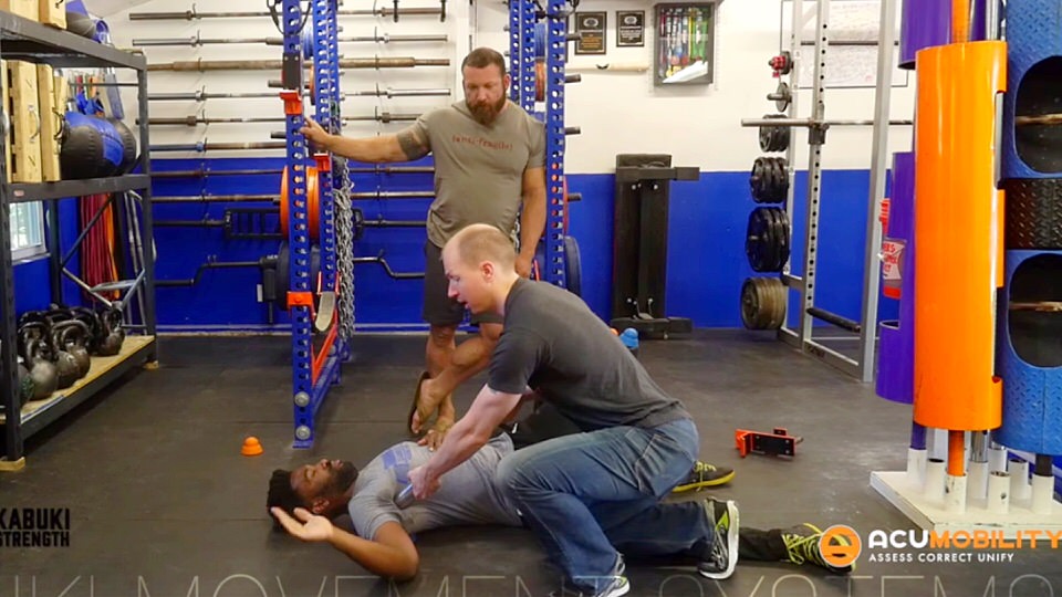 acumobility ball lat mobility for releasing the shoulder with Chris Duffin from Kabuki Strength using the boomstick