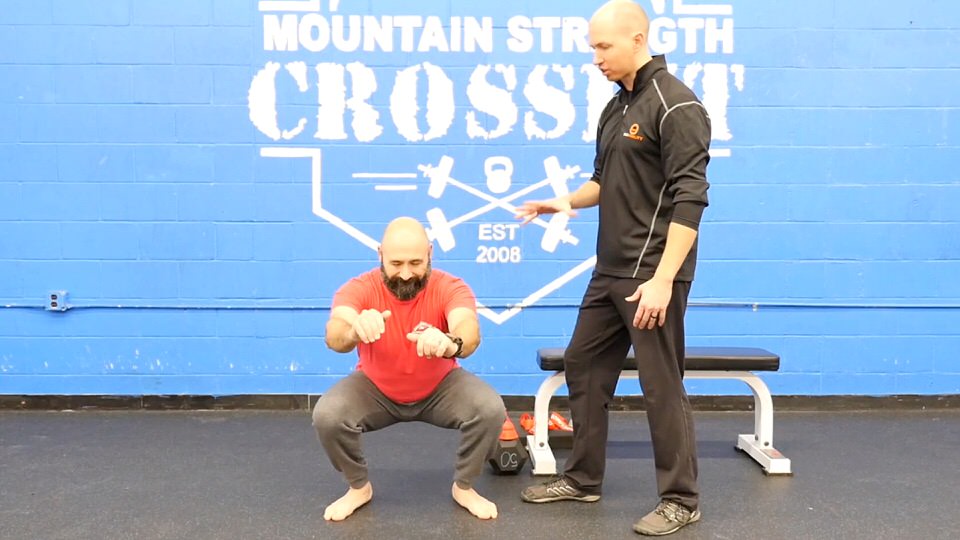 using the acumobility ball and acumobility floss bands to fix ankle pain and ankle mobility in the squat